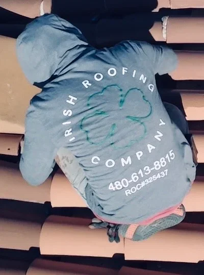 Clay tile roof installation with terracotta shingles and proper overlap technique